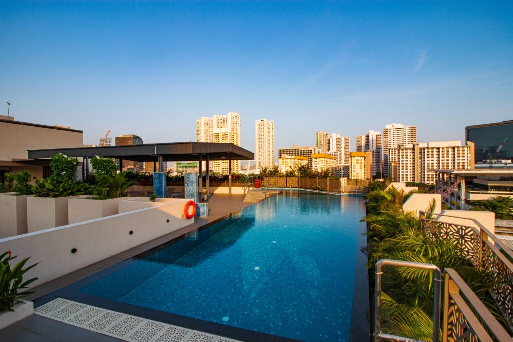 Aqueen Prestige Jalan Besar rooftop pool with sunset