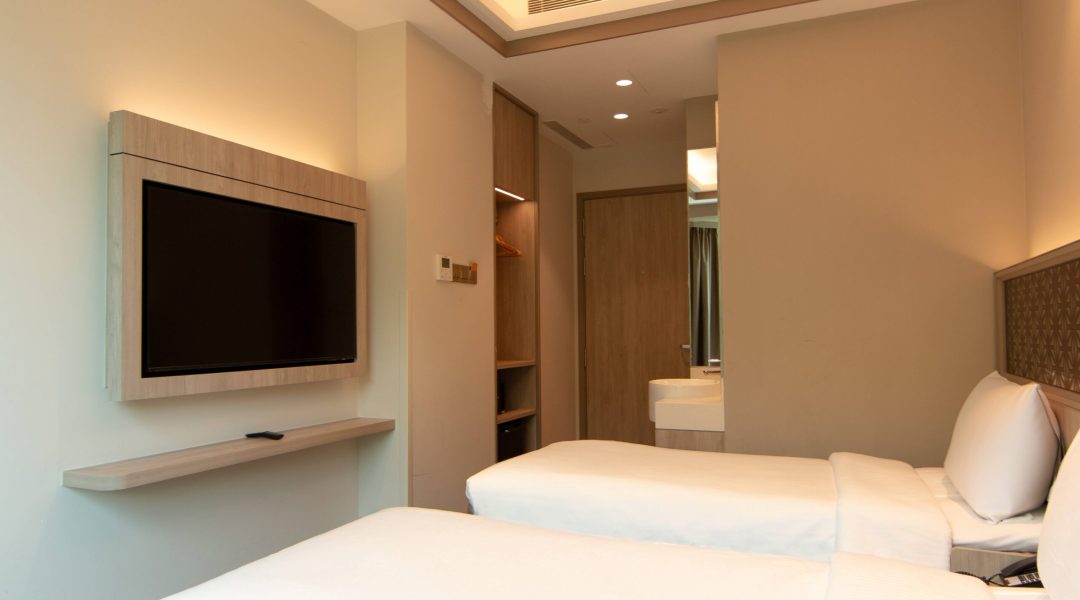 Prestige Jalan Besar Superior Queen Room TV and entrance to toilets